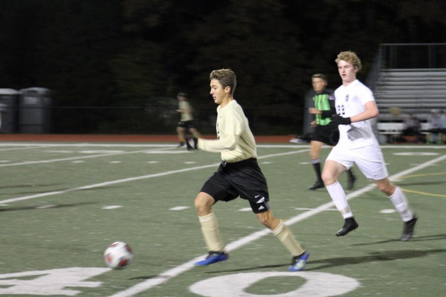 Tyler Ballew moves the ball down the field in the middle of the second half.