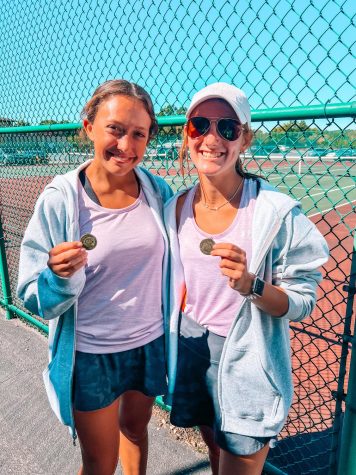 Hard Work Pays Off: Duo Brings Home A District Title
