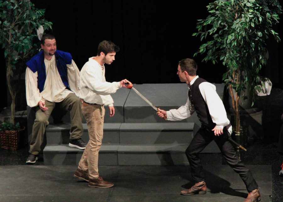 Tom Ford, the lead actor in the teacher play, practices  for the play with Anthony Bringaze. 