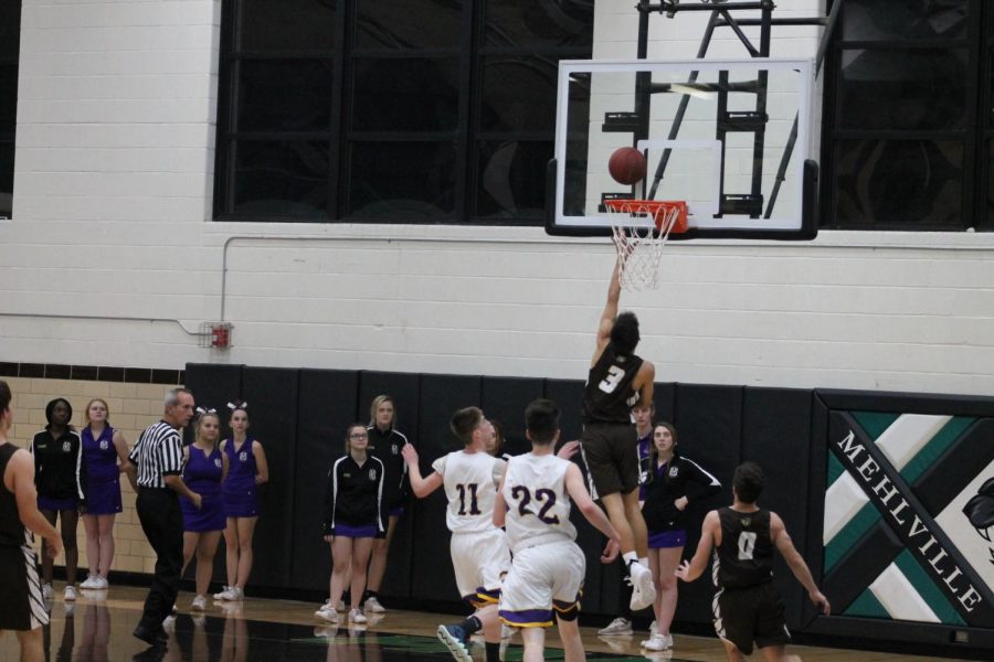 Ethan Worley takes a layup.