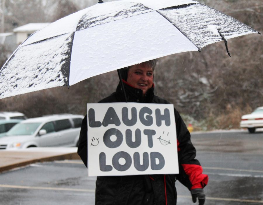 Teacher at Windsor High School, Mrs. Boehm, greets students with a lighthearted poster.