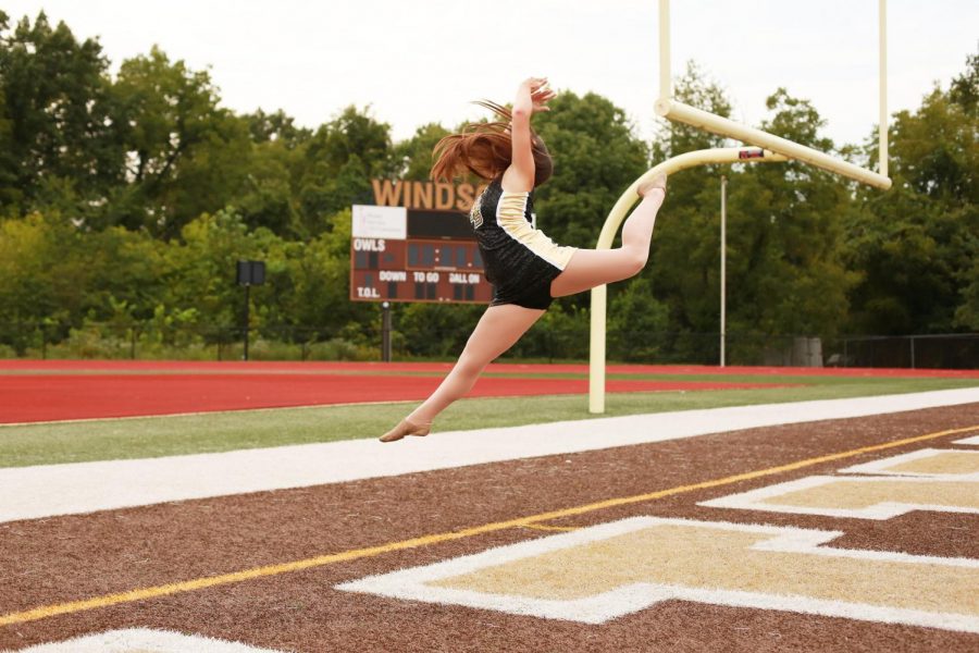 Captain Hannah Scott jumping for joy her senior year.