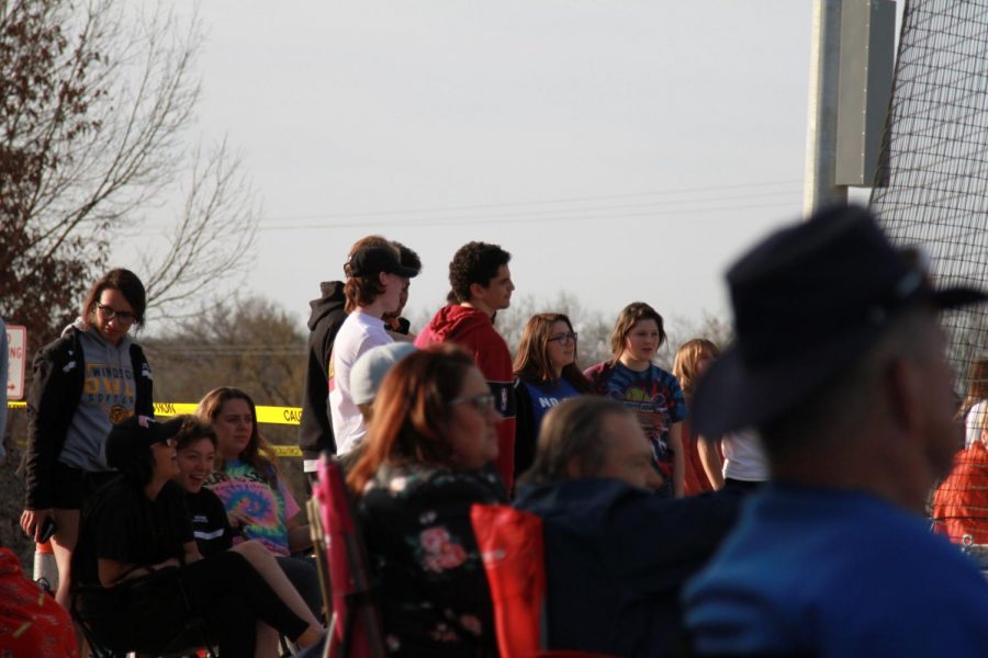 Several students came to cheer on the baseball team. 