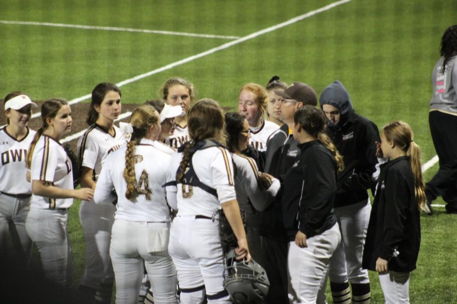 Coach Wayne Montgomery talks to the team during the district title game. 