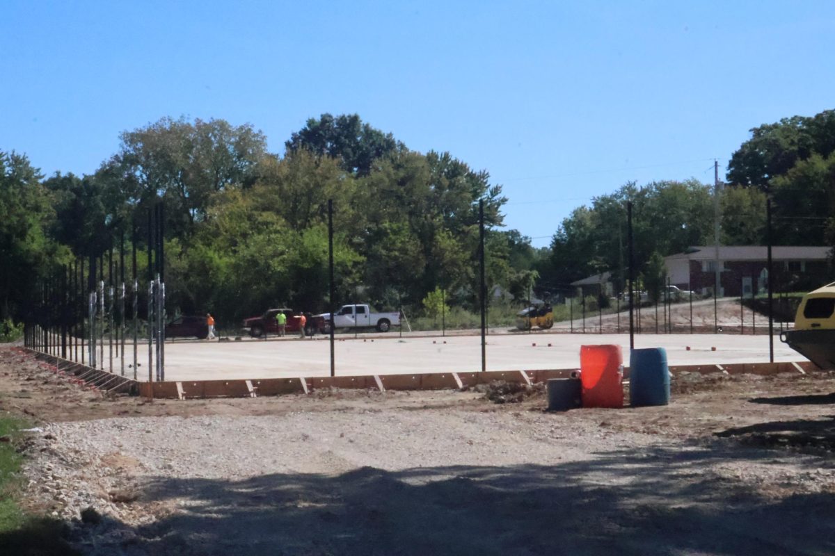 Five new tennis courts are being constructed next to the current baseball/softball field. 